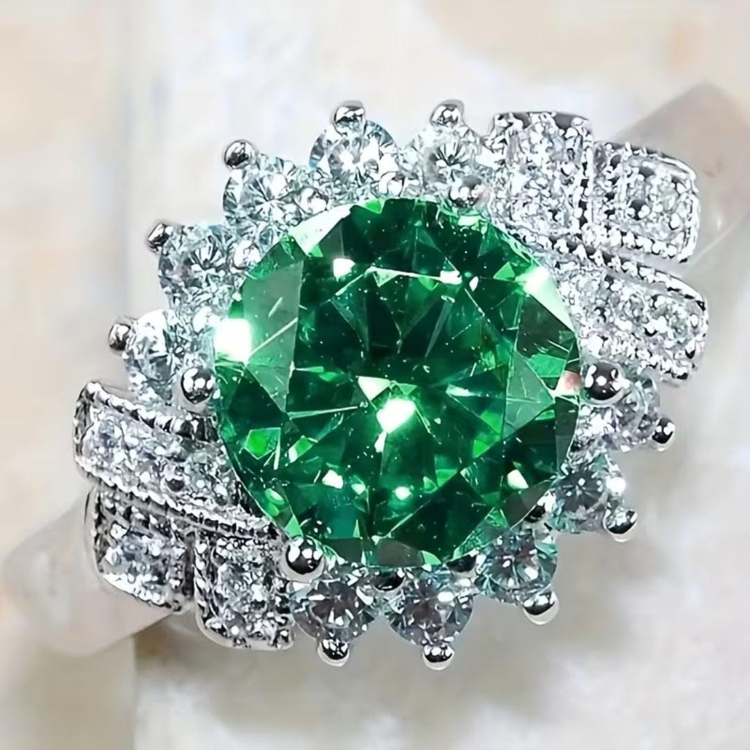 Εντυπωσιακό Δαχτυλίδι Emerald Grand Halo