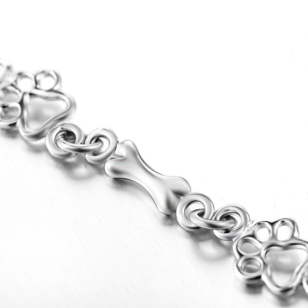 Βραχιόλι Limited Edition από Καθαρό Ασήμι με Charms Πατουσάκι και Κοκαλάκι